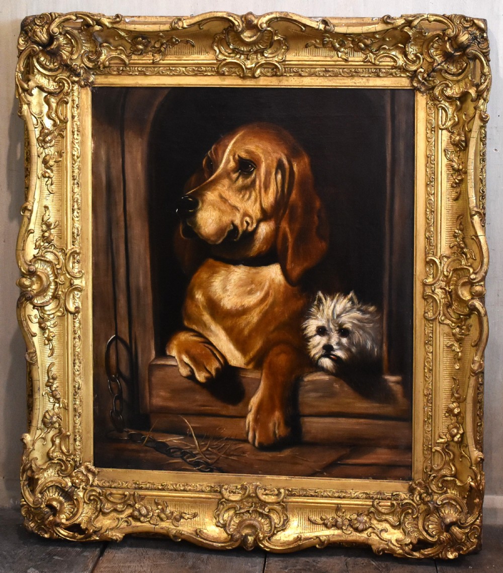 An oil painting depicting a large brown hound and a small white terrier peering from a dark wooden structure within a carved gold frame. View III
