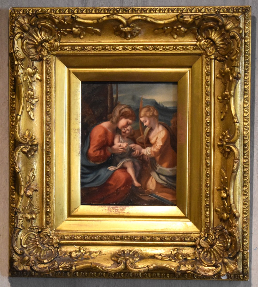 A small framed watercolour painting depicting the Madonna and Child with Saint Catherine set inside a gilded carved wood frame. View III