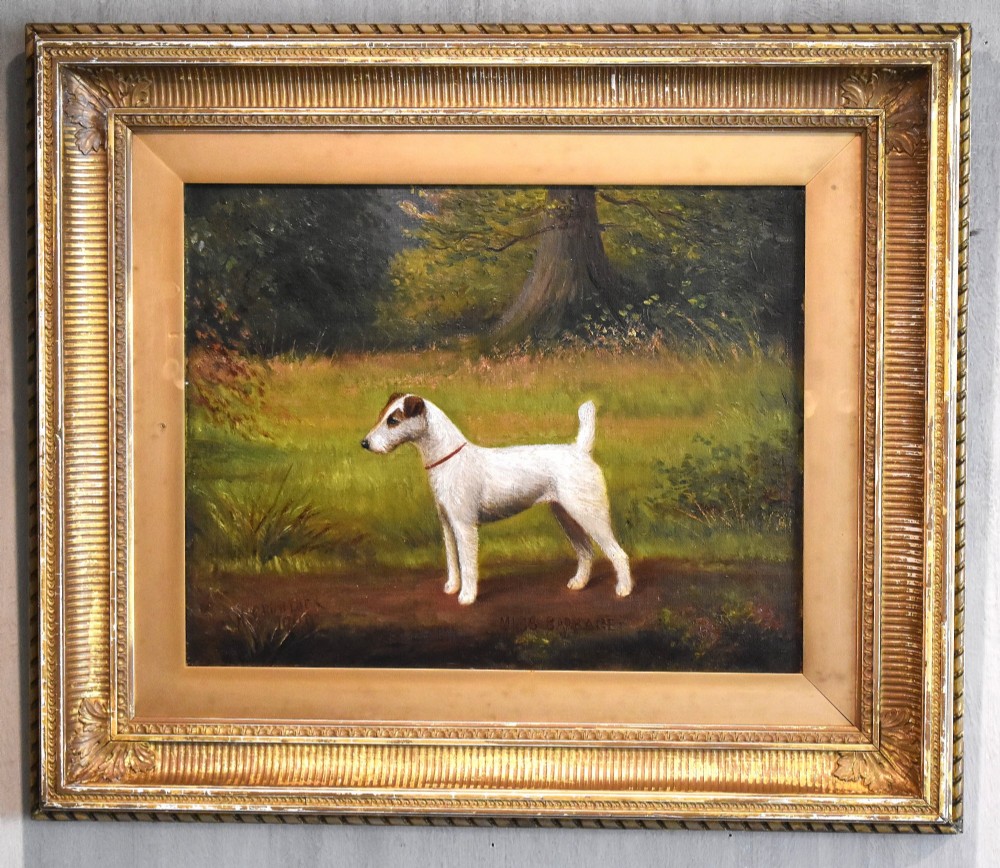 An oil painting of a white terrier standing in profile in a green field within a gilded frame. View II