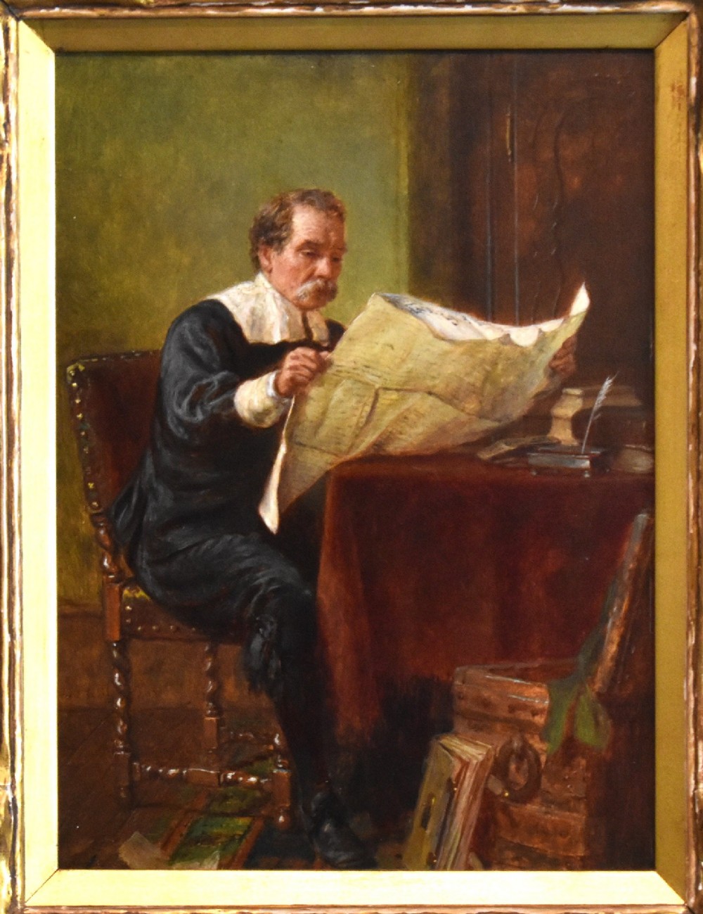 A 19th-century oil painting by John Watkins Chapman depicting a man in historic dress reading at a desk, mounted inside a gilded frame. View III