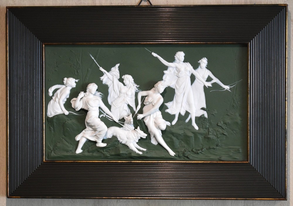 A pair of framed Art Nouveau Dresden porcelain plaques featuring white high-relief mythological figures on a dark green ground within reeded black frames. View III