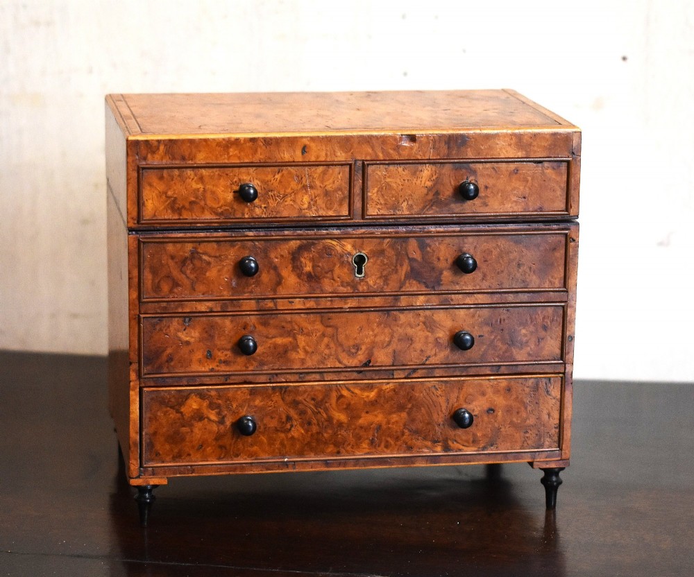 Superb miniature chest of drawers writing necessaire