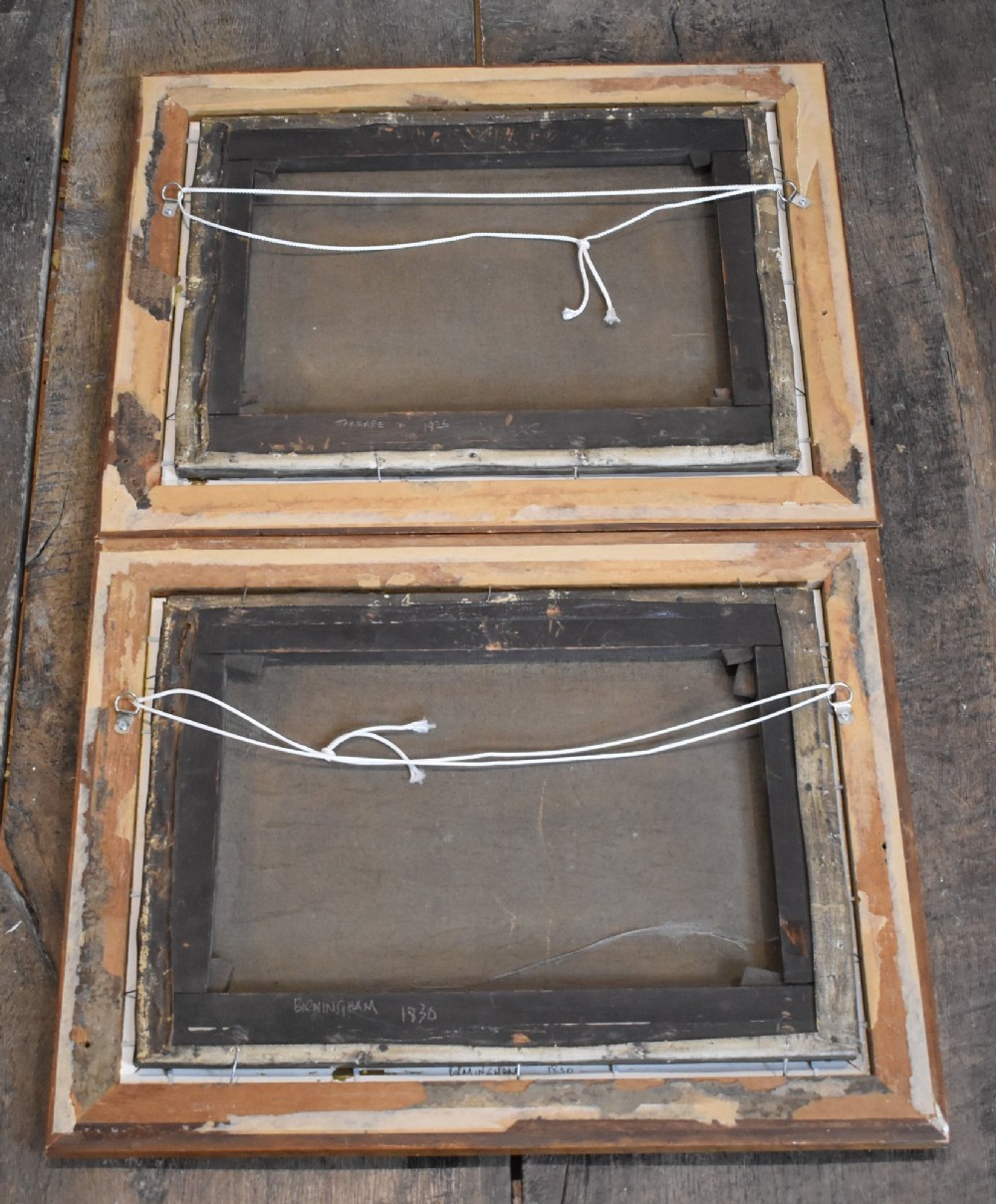 A vertical pair of framed antique sporting prints depicting racehorses and jockeys set in golden maple frames with brass title plaques. View VII