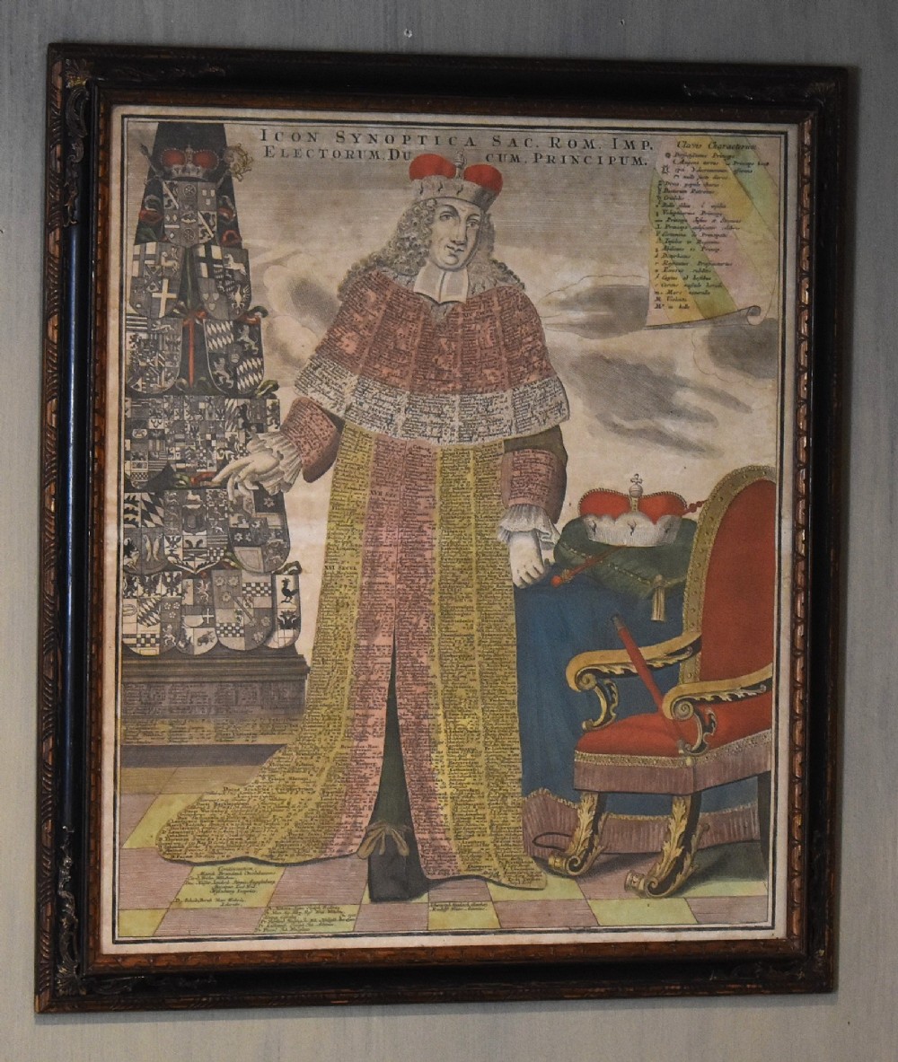 An 18th-century framed print featuring a standing figure in ceremonial robes alongside heraldic shields and Latin text. View II