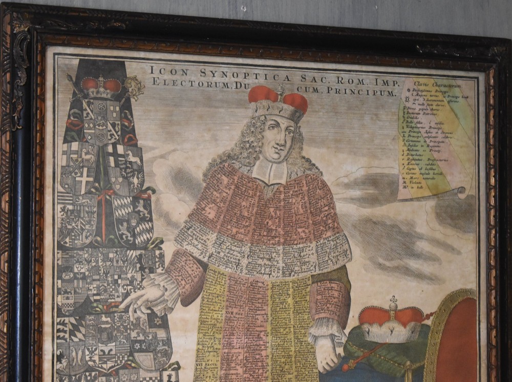 An 18th-century framed print featuring a standing figure in ceremonial robes alongside heraldic shields and Latin text. View IV