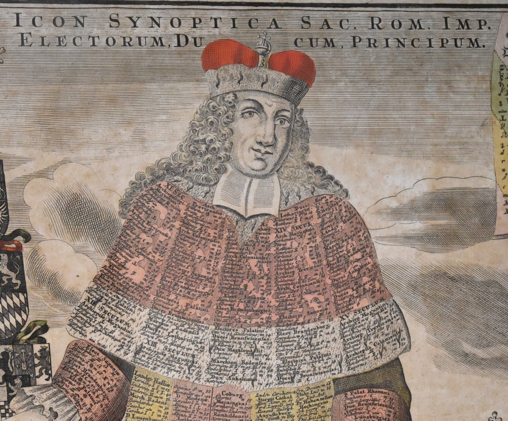 An 18th-century framed print featuring a standing figure in ceremonial robes alongside heraldic shields and Latin text. View V