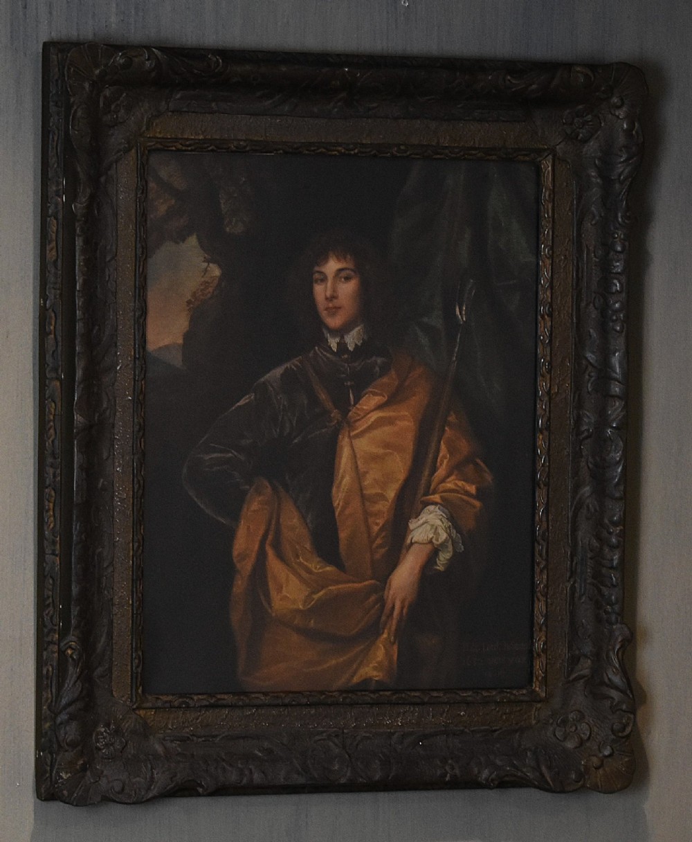 A framed portrait print depicting Philip, Lord Wharton, draped in an amber cloak against a dark background, set within a carved dark wood frame. View II