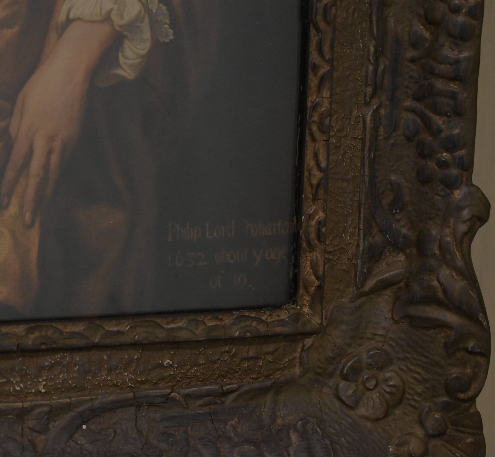 A framed portrait print depicting Philip, Lord Wharton, draped in an amber cloak against a dark background, set within a carved dark wood frame. View V