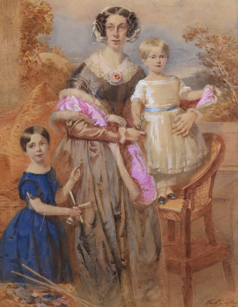 A mid-19th-century watercolour portrait depicting a mother with two young children, presented in a birds eye maple frame with a gold slip. View V