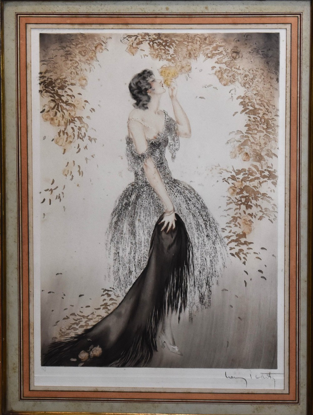 A set of three framed Art Deco fashion prints by Louis Icart featuring figures in 1920s gowns, presented in two oval and one rectangular gilt frames. View IV
