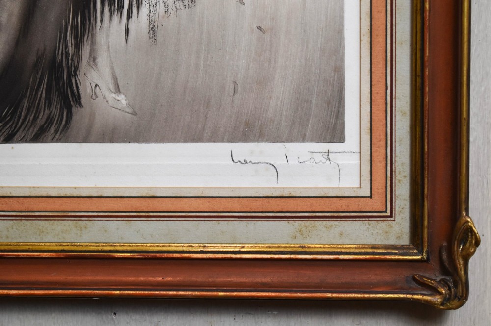 A set of three framed Art Deco fashion prints by Louis Icart featuring figures in 1920s gowns, presented in two oval and one rectangular gilt frames. View V