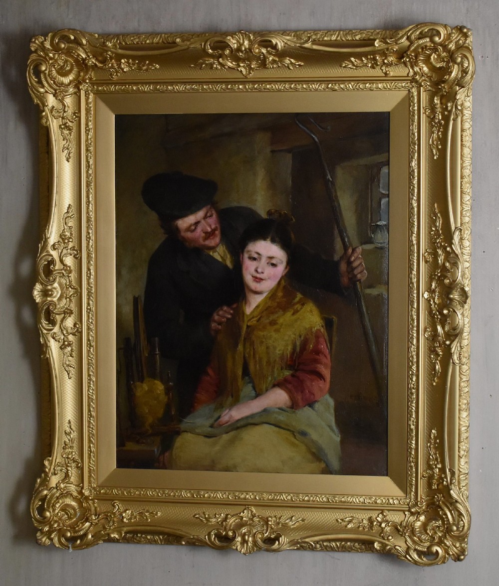 A 19th-century genre oil painting in an ornate gilt frame depicting a seated woman wearing a yellow shawl with a standing man behind her inside a rustic interior. View II