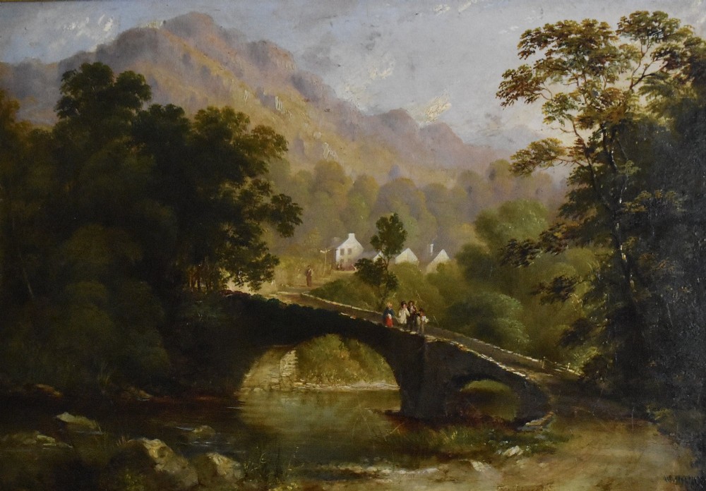 A nineteenth-century Victorian oil painting depicting a river scene with a stone arch bridge and distant mountains, housed within an ornate gilded frame. View IV