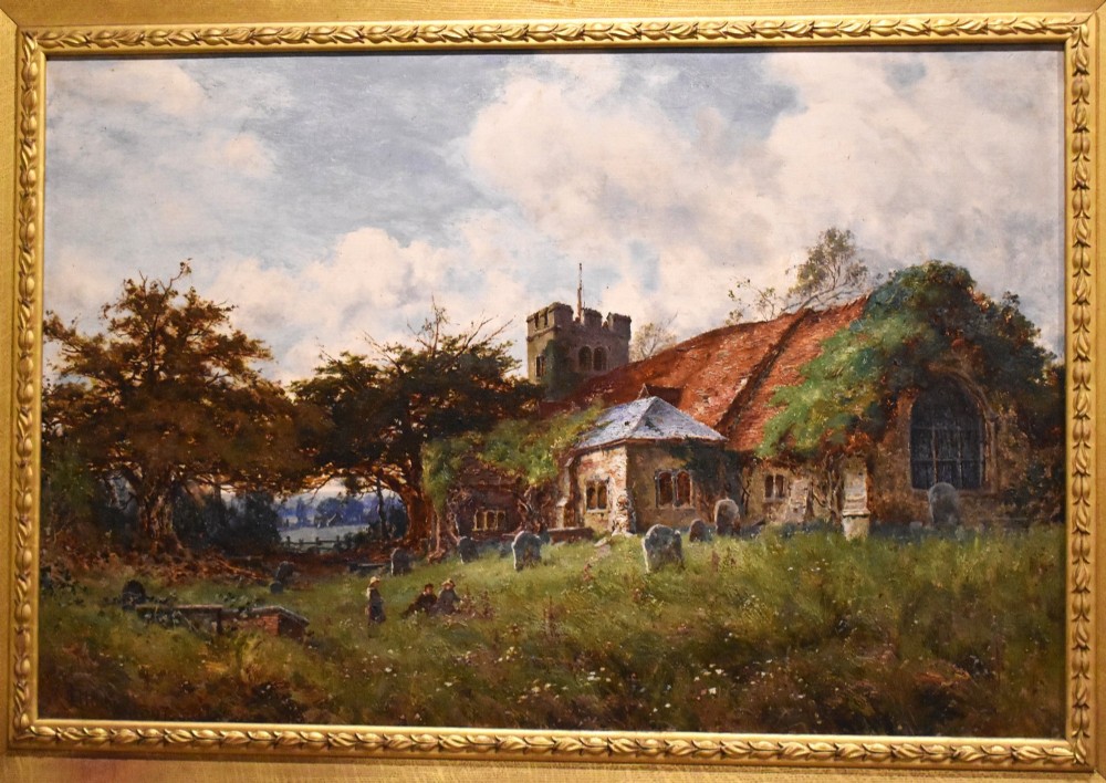 A Victorian landscape oil painting in an ornate gilded frame depicting a stone parish church and churchyard surrounded by trees under a cloudy sky. View III
