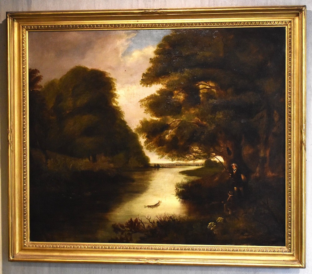 A Victorian oil painting in a gilded frame depicting a fisherman beside a quiet river surrounded by large foliage. View II