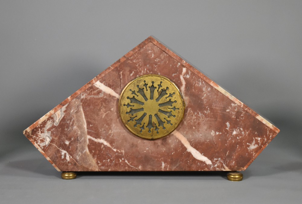 A French Art Deco three-piece clock set made from geometric pink and black veined marble with brass mounts. View XI