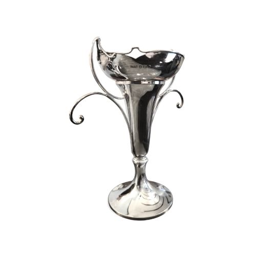 fig 1. An antique sterling silver Art Nouveau vase with sweeping scroll handles, a shaped rim, and a circular pedestal base.