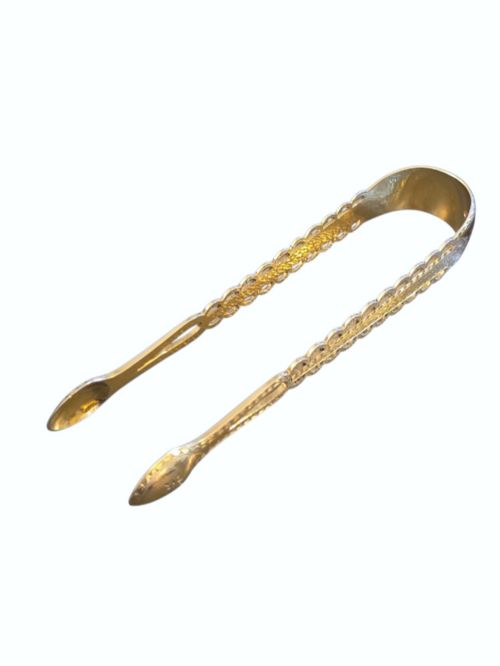 fig 2. A pair of Victorian silver-gilt sugar tongs featuring decorative pierced arms and engraved spoon-shaped ends.