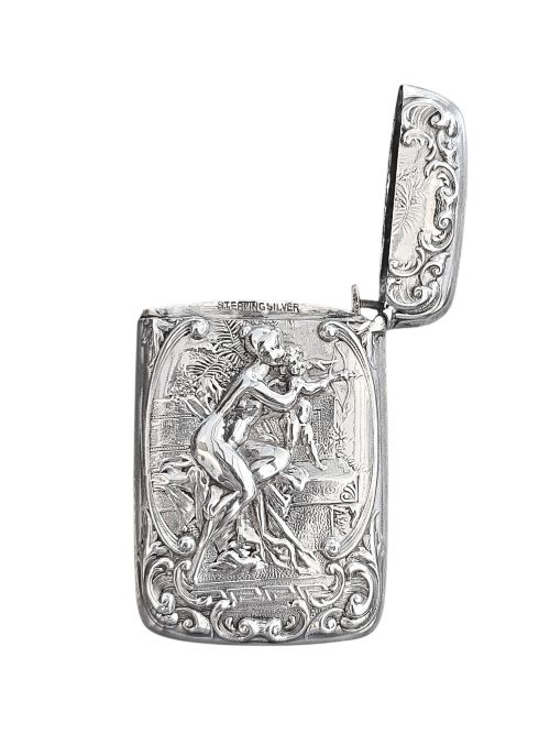 fig 1. An Edwardian sterling silver vesta case featuring embossed relief detailing of Cupid and Psyche framed by scrollwork borders.