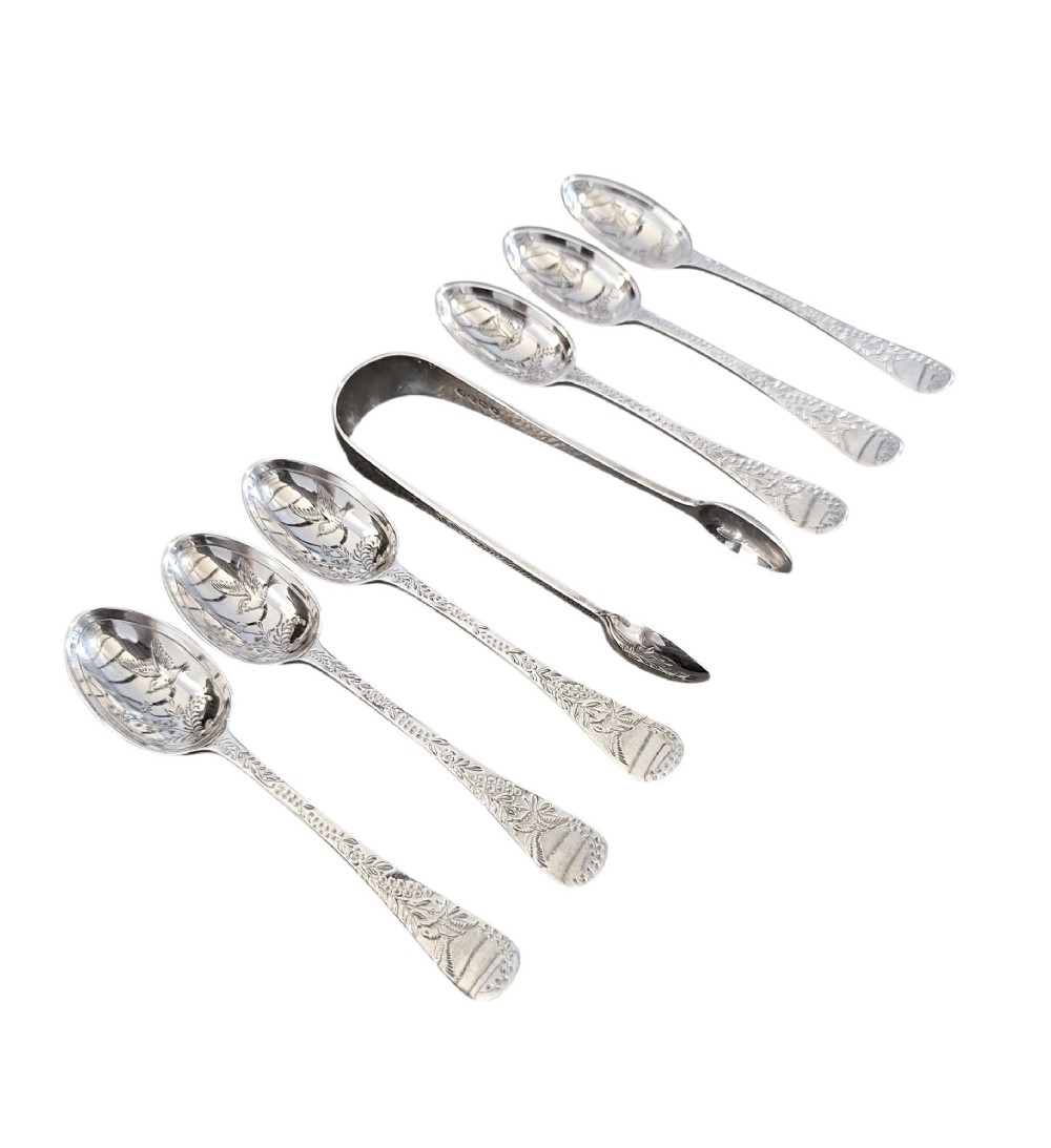 Set of six Victorian sterling silver teaspoons and matching sugar tongs featuring engraved bird and foliate motifs.
