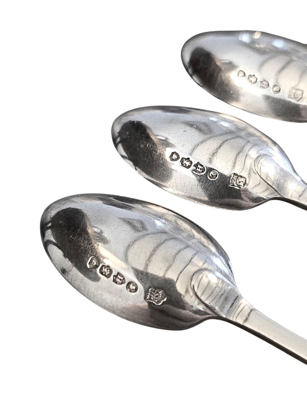 Set of six Victorian sterling silver teaspoons and matching sugar tongs featuring engraved bird and foliate motifs. View V