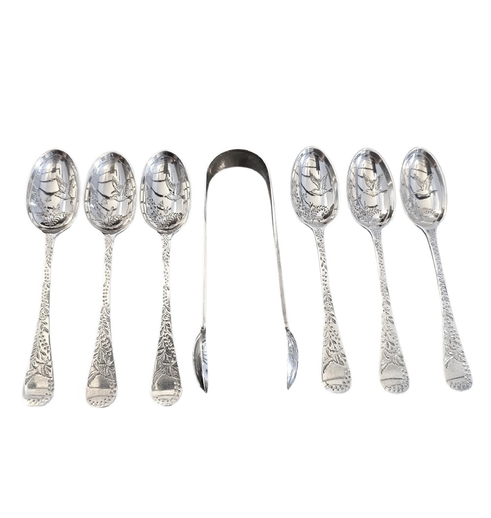 Set of six Victorian sterling silver teaspoons and matching sugar tongs featuring engraved bird and foliate motifs. View VI