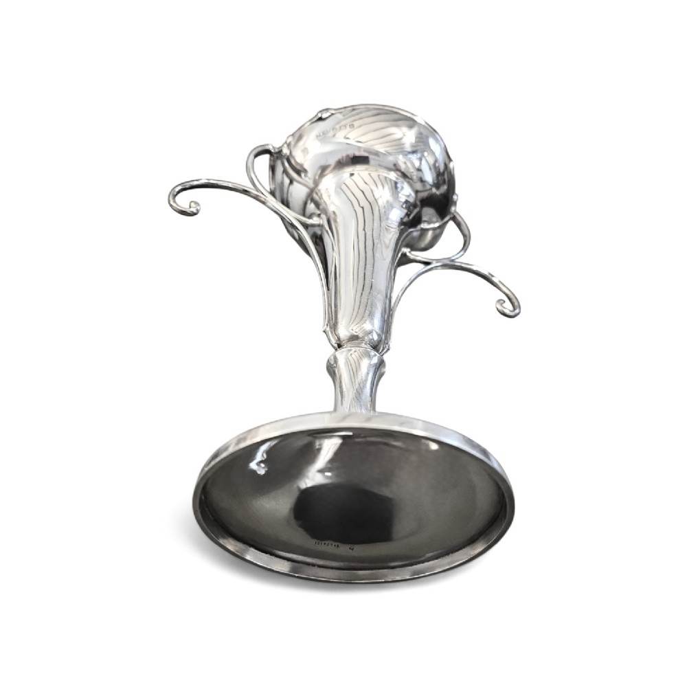 An antique sterling silver Art Nouveau vase with sweeping scroll handles, a shaped rim, and a circular pedestal base. View III