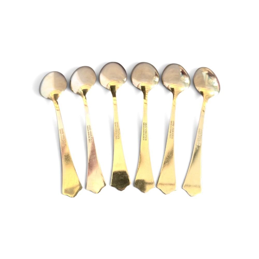 Set of six sterling silver gilt coffee spoons featuring white guilloche enamel flared handles. View II