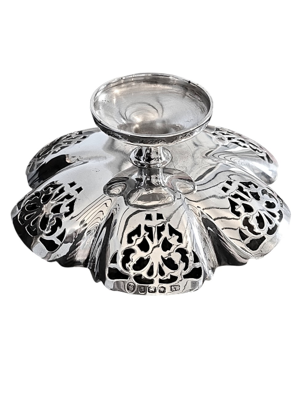 A hallmarked sterling silver bonbon dish featuring a pierced scalloped rim and a short pedestal foot. View IV