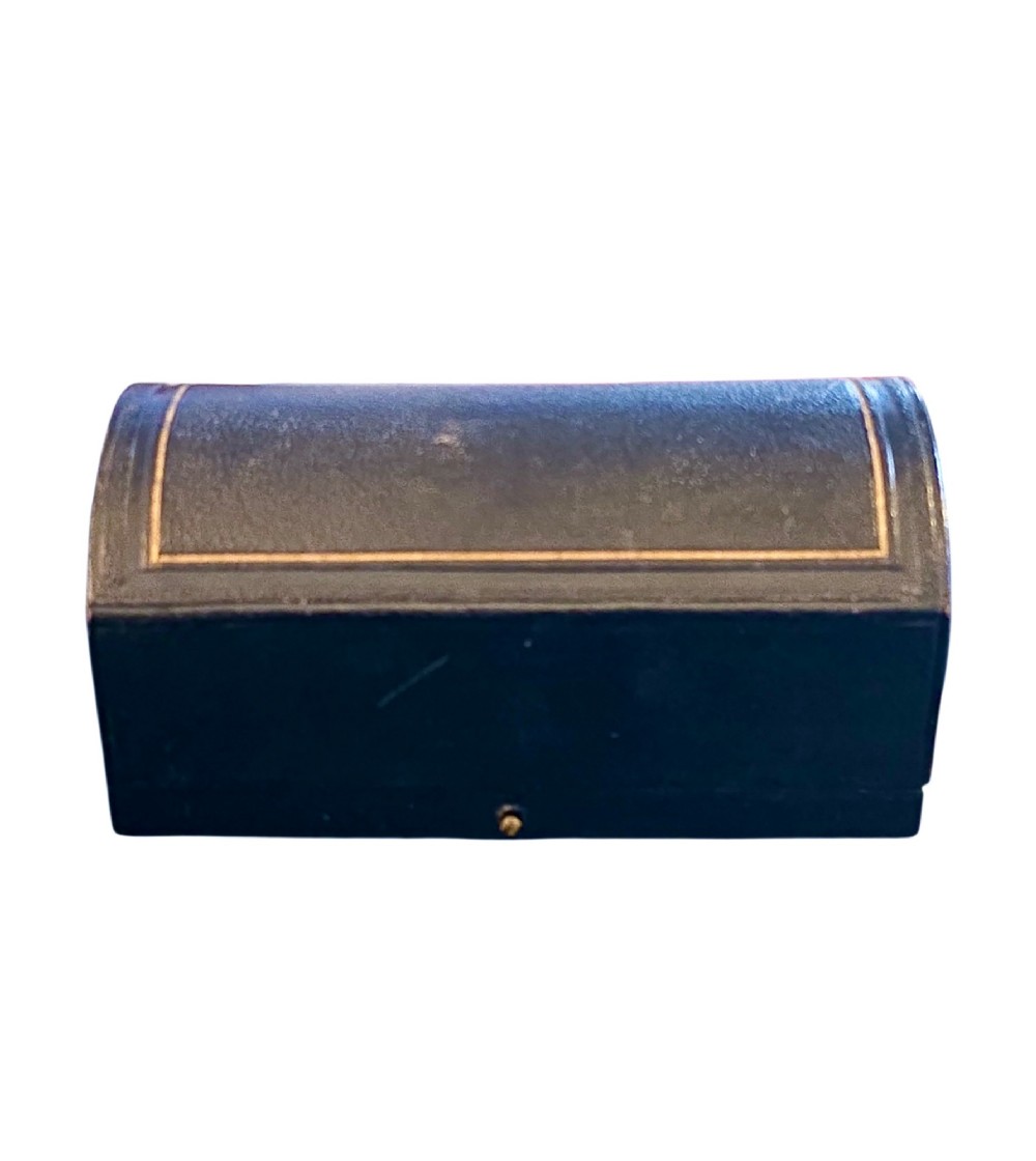 A pair of Edwardian pierced sterling silver napkin rings with unengraved cartouches presented in a dark velvet-lined fitted box. View VIII