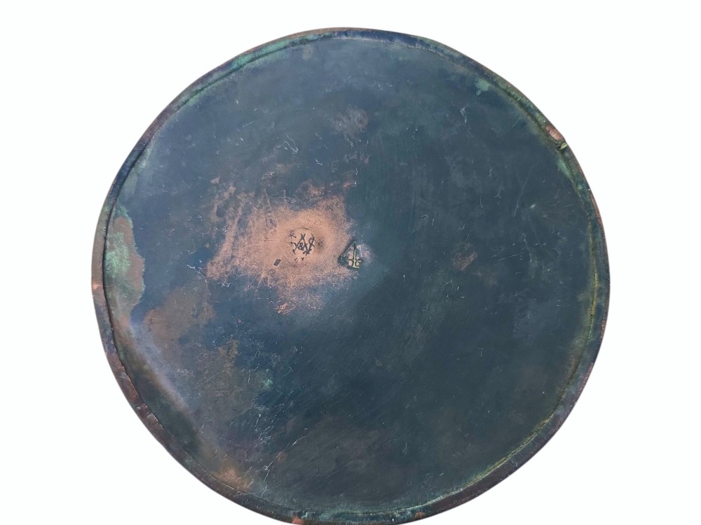 An antique Arts and Crafts copper jug featuring a planished finish, riveted collar, brass handle, and inset coloured cabochons. View VIII