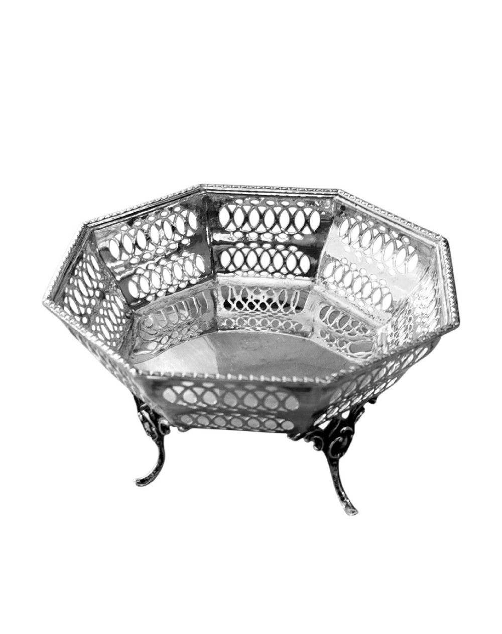 An octagonal sterling silver bonbon dish featuring pierced fretwork sides and three splayed scroll feet.