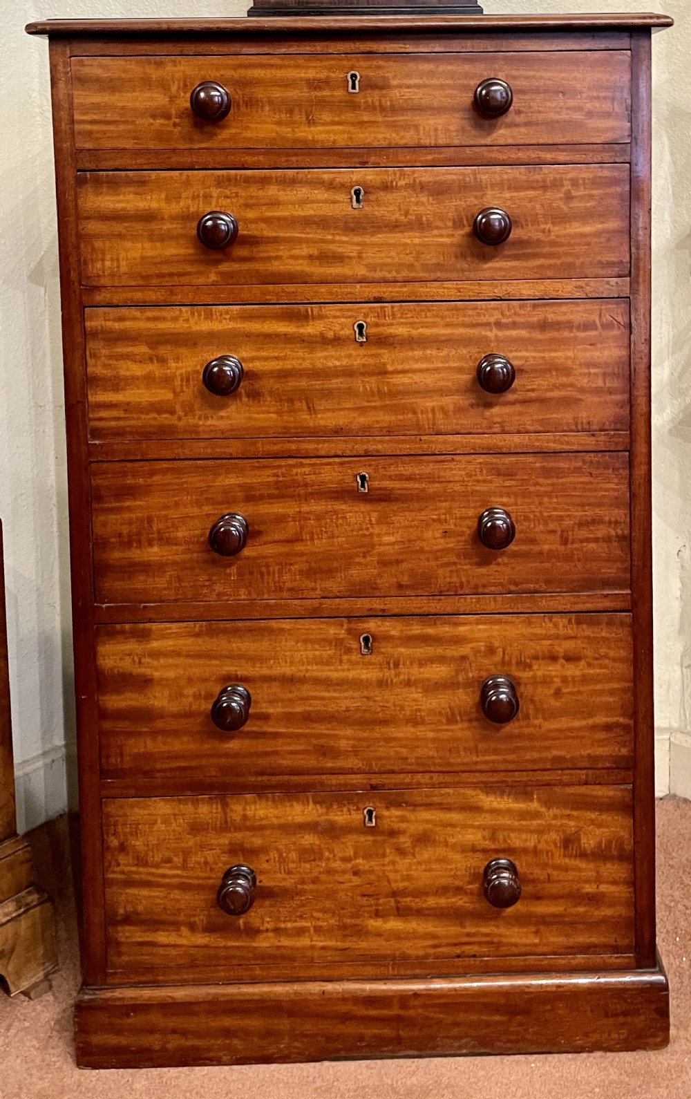 An Early 19th Century Solid Mahogany Tall Chest Of Drawers By Heal & Son