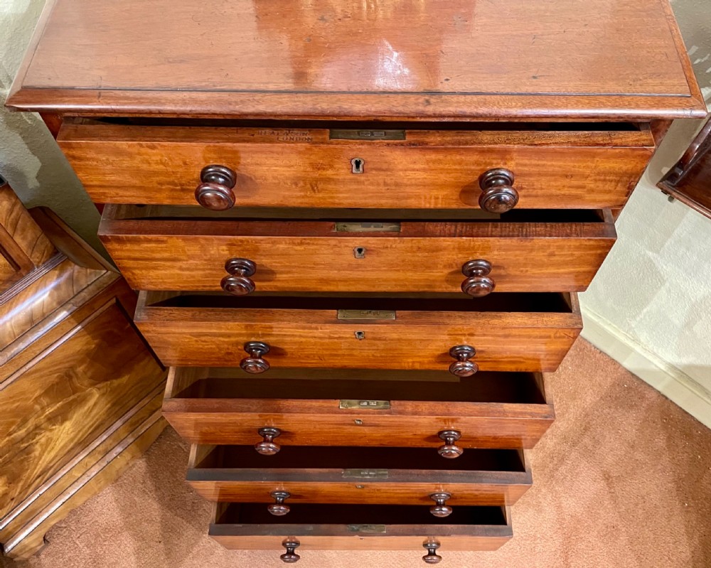 An Early 19th Century Solid Mahogany Tall Chest Of Drawers By Heal & Son View II