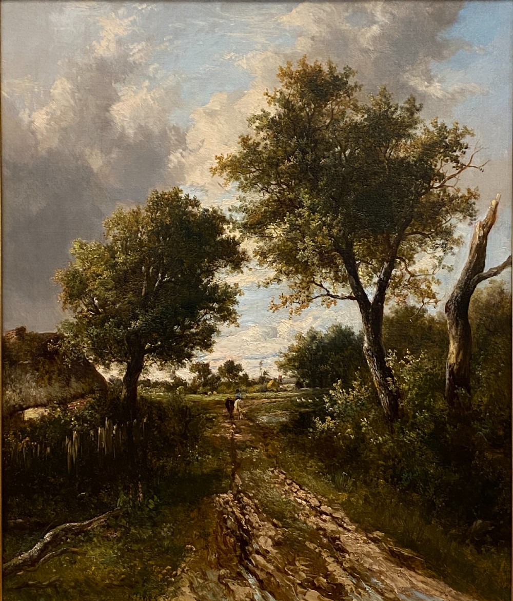 A 19th-century oil painting on canvas depicting a rutted dirt track through a wooded landscape, framed in a gilded moulded frame. View II