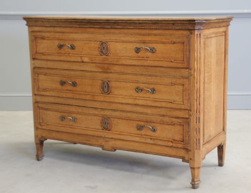 A 19th Century French Oak Commode.