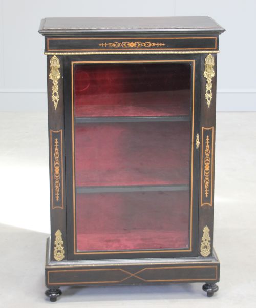 fig 1. A Victorian ebonized display cabinet.