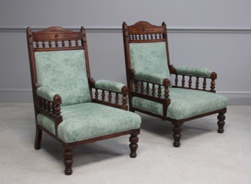 A Pair of Oak Victorian "His @ Hers" Chairs