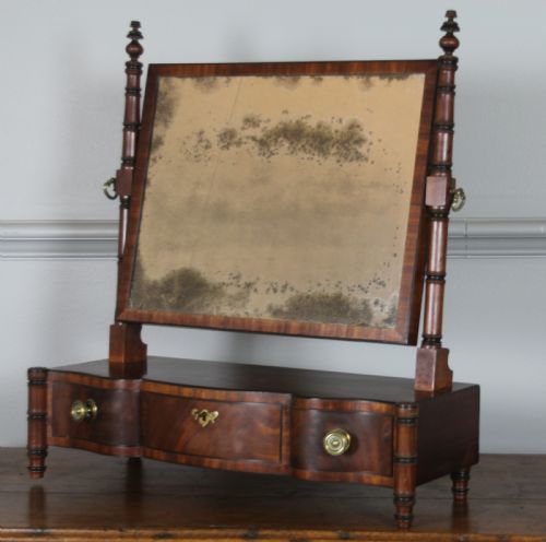 fig 1. A REGENCY MAHOGANY SWING MIRROR