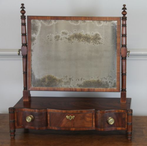 fig 2. A REGENCY MAHOGANY SWING MIRROR