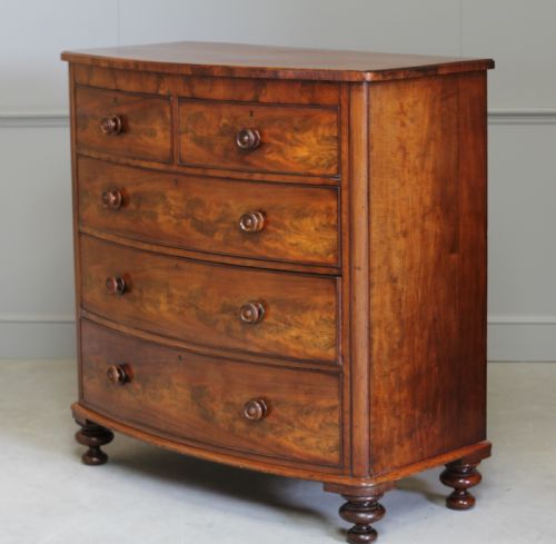 A Victorian Curl Mahogany Bow Fronted Chest of Drawers