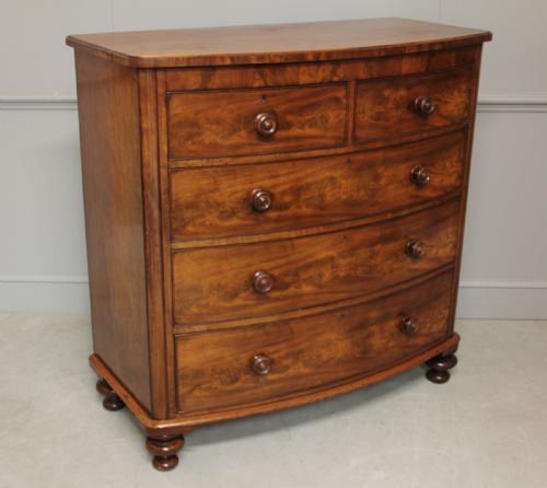 fig 1. A Victorian Curl Mahogany bow fronted chest of drawers