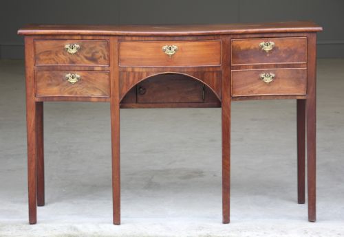 A Regency Mahogany Serpentine Sideboard