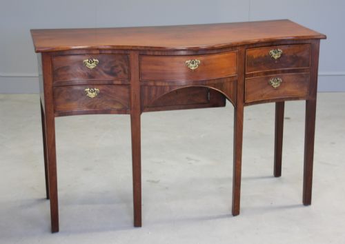 fig 1. A REGENCY MAHOGANY SERPENTINE SIDEBOARD