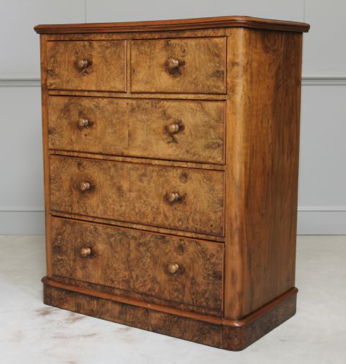 fig 1. A Victorian burr walnut chest of drawers.