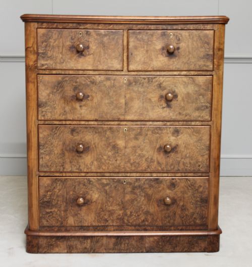 fig 2. A Victorian burr walnut chest of drawers.