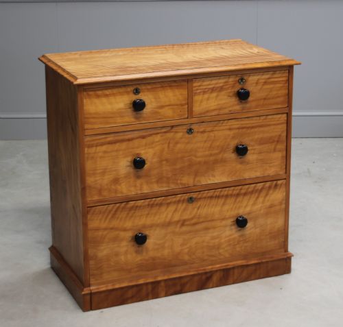 fig 1. A VICTORIAN SATINBIRCH CHEST OF DRAWERS