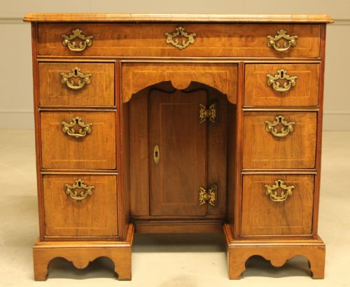 fig 1. An early 18th century walnut kneehole desk.