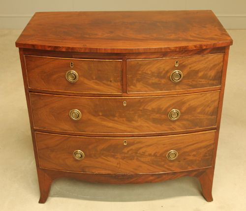 fig 2. A Regency bow front chest of drawers.