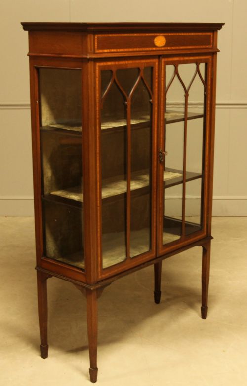 fig 1. AN EDWARDIAN MAHOGANY DISPLAY CABINET